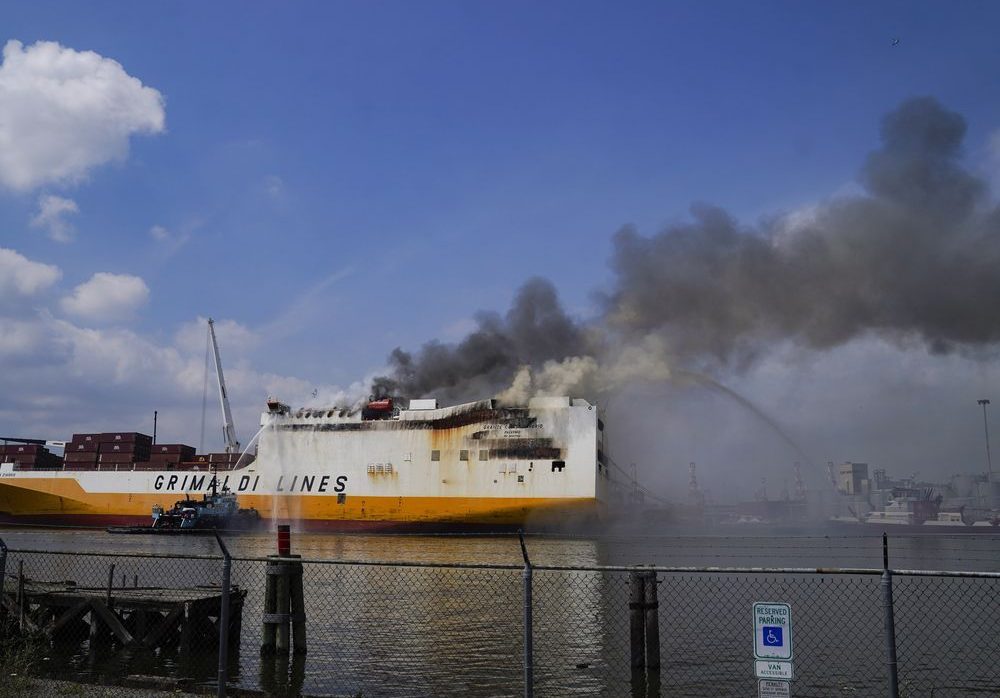 Crews continue to battle cargo ship blaze that killed 2 New Jersey firefighters